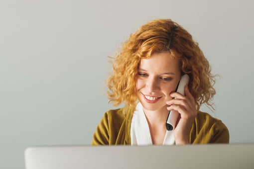 Businesswoman Speaking On The Phone At The Office Businesswoman Speaking On The Phone At The Office